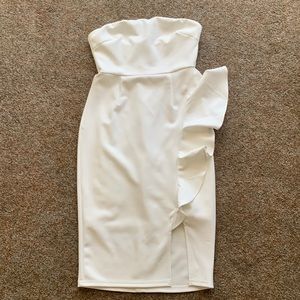 White, fitted, strapless dress. Bride rehearsal dress.